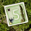 spiral earth - cafe table numbers - Whitworth